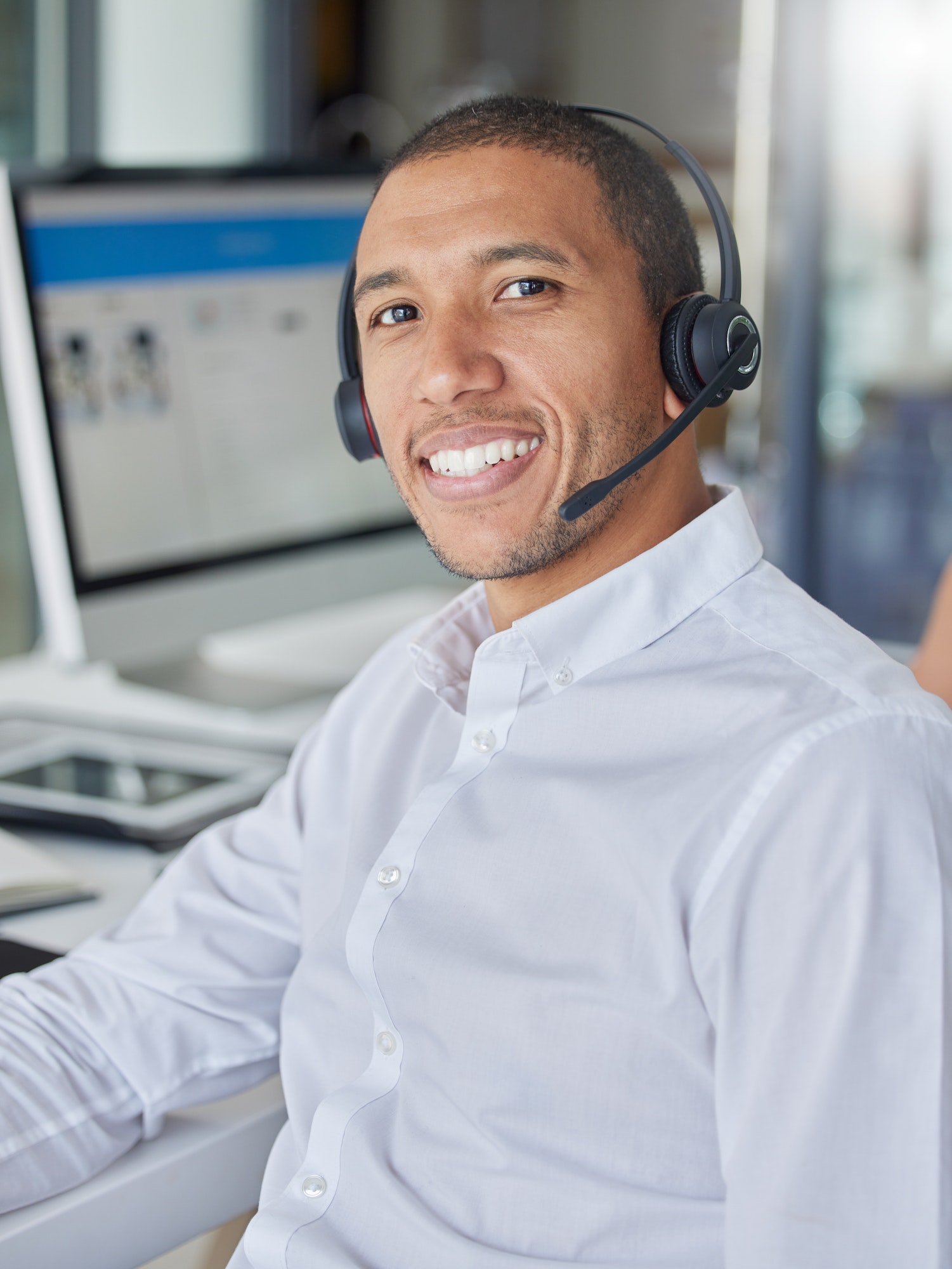 Black man, call center portrait and smile by computer for consulting, contact us and tech support i