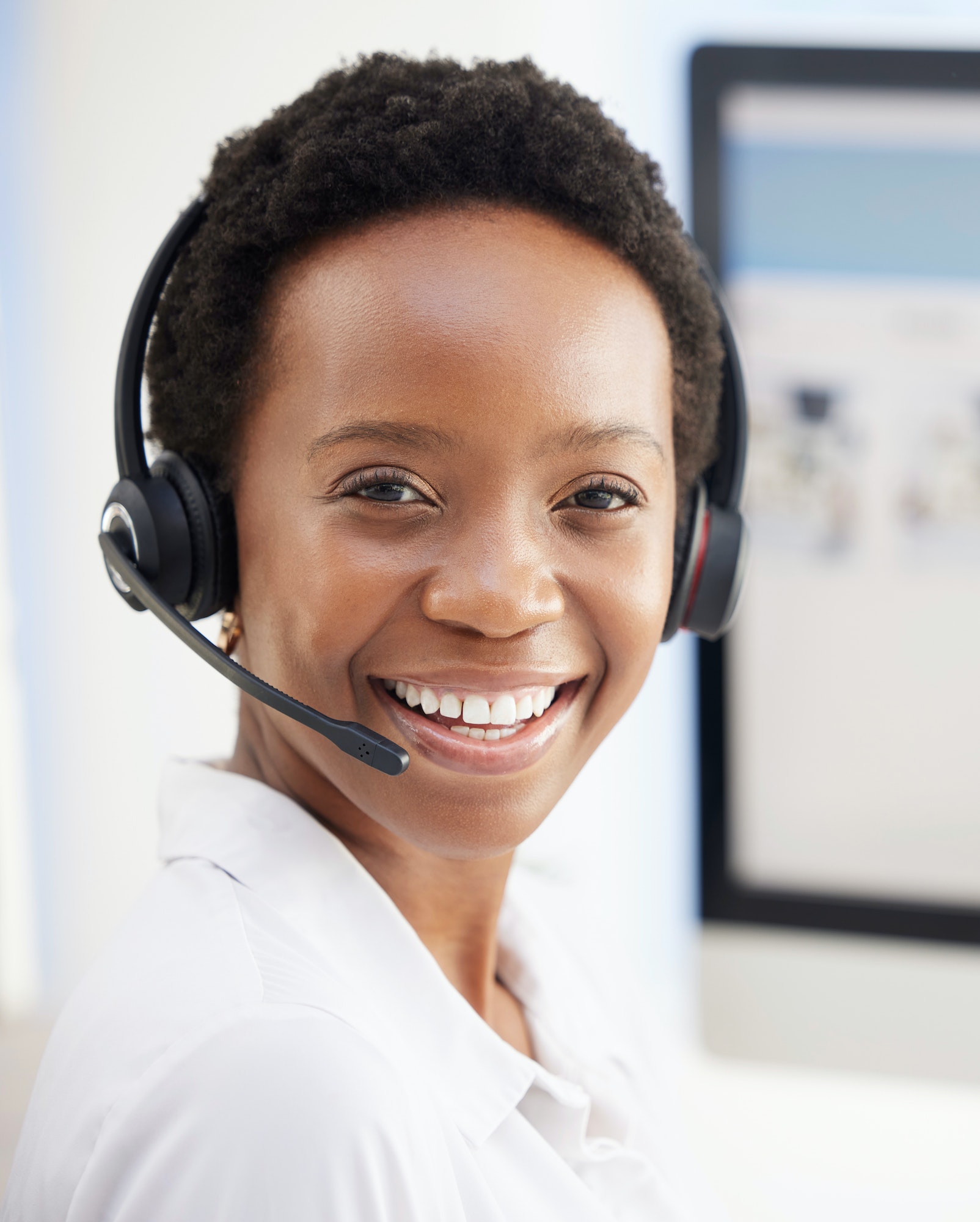 Portrait, happy or call center black woman for telemarketing success, customer support or contact u
